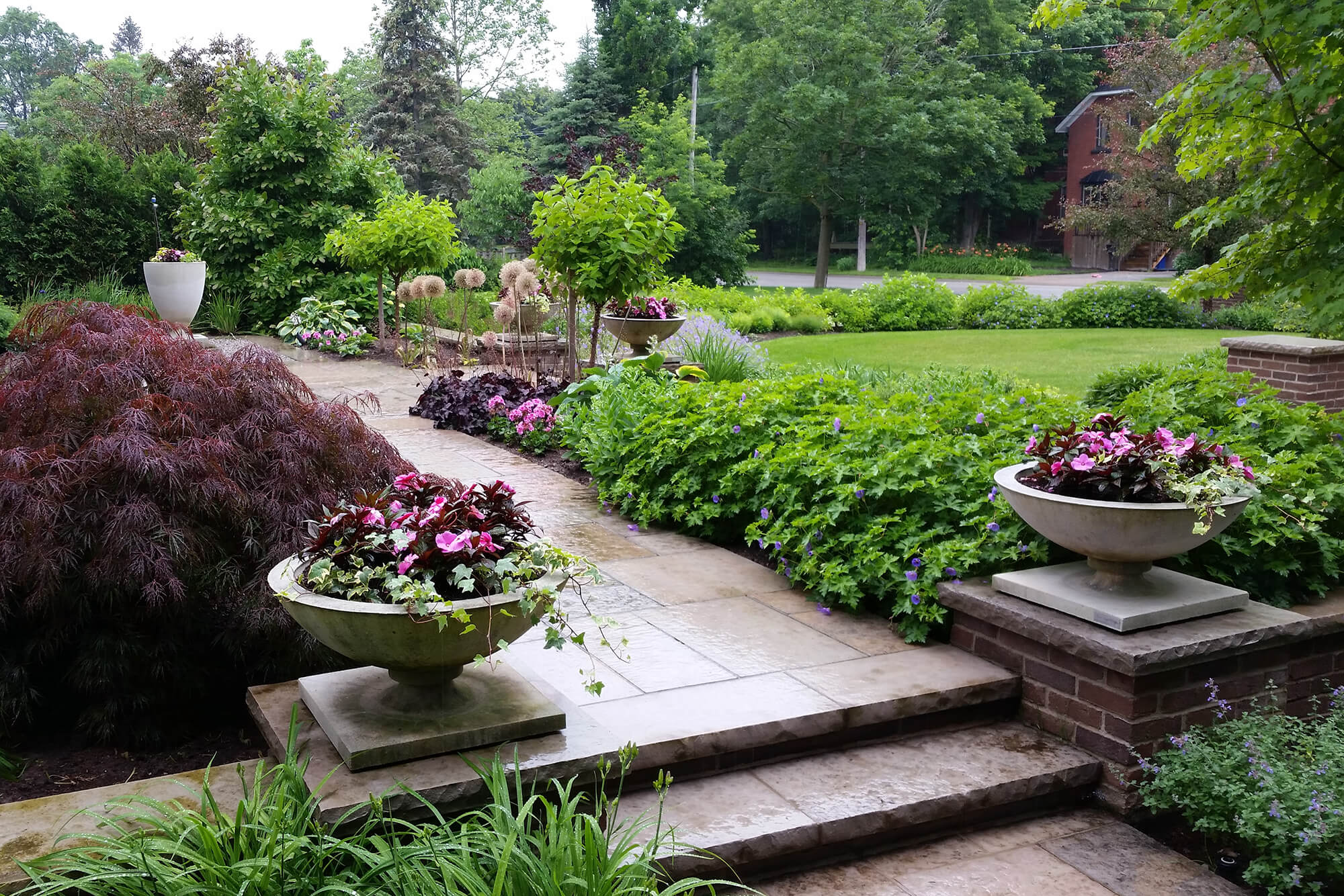 garden path with urns and plants